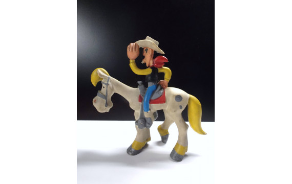 RARE Grand pouet Lucky Luke à cheval avec sifflet TBE